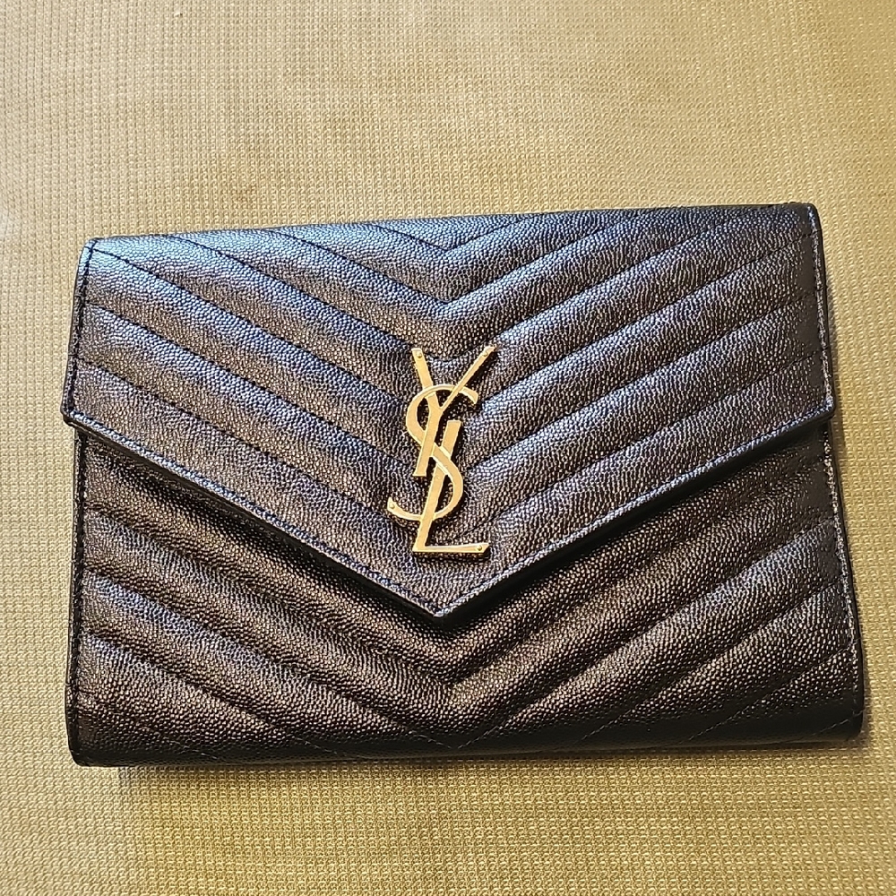 Saint Laurent Black Clutch with Gold Logo